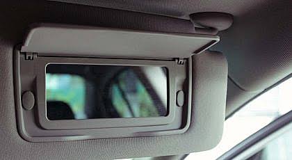 The Hidden Mirror In Your Sun Visor Actually Has A Surprising Backstory