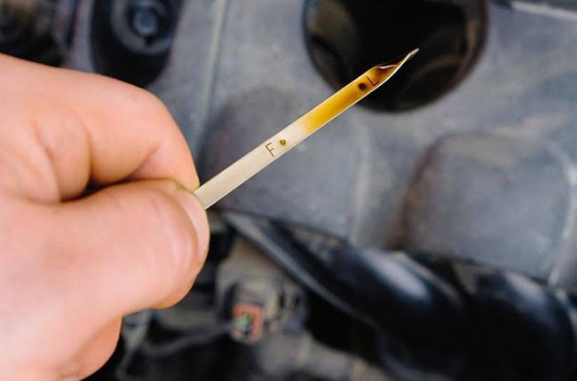 How to tell if your car's engine oil is low or overfilled?